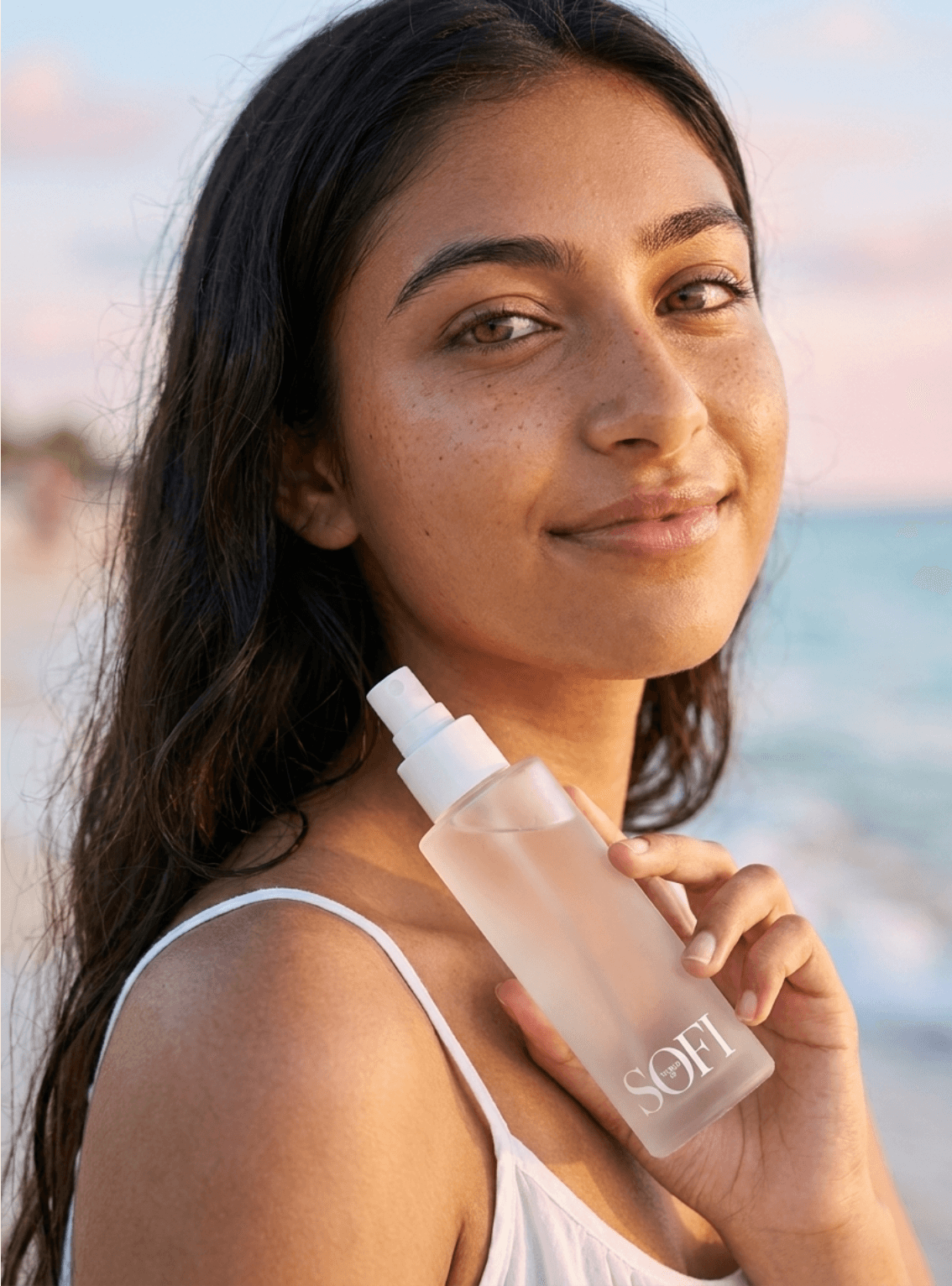 Sofi holding the SOFI mist